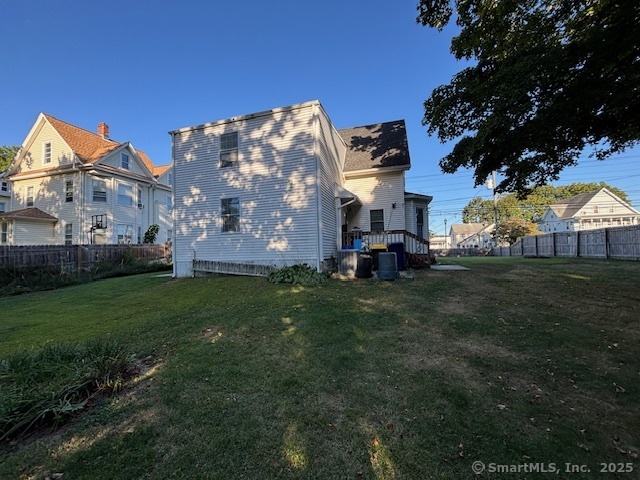 193 Wakelee Avenue Ansonia, CT 06401 - Photo 10 of 38 a view of a house with a back yard