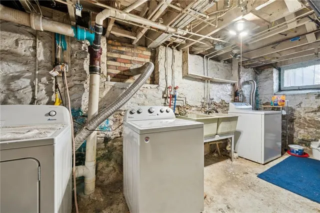 a utility room with dryer and washer