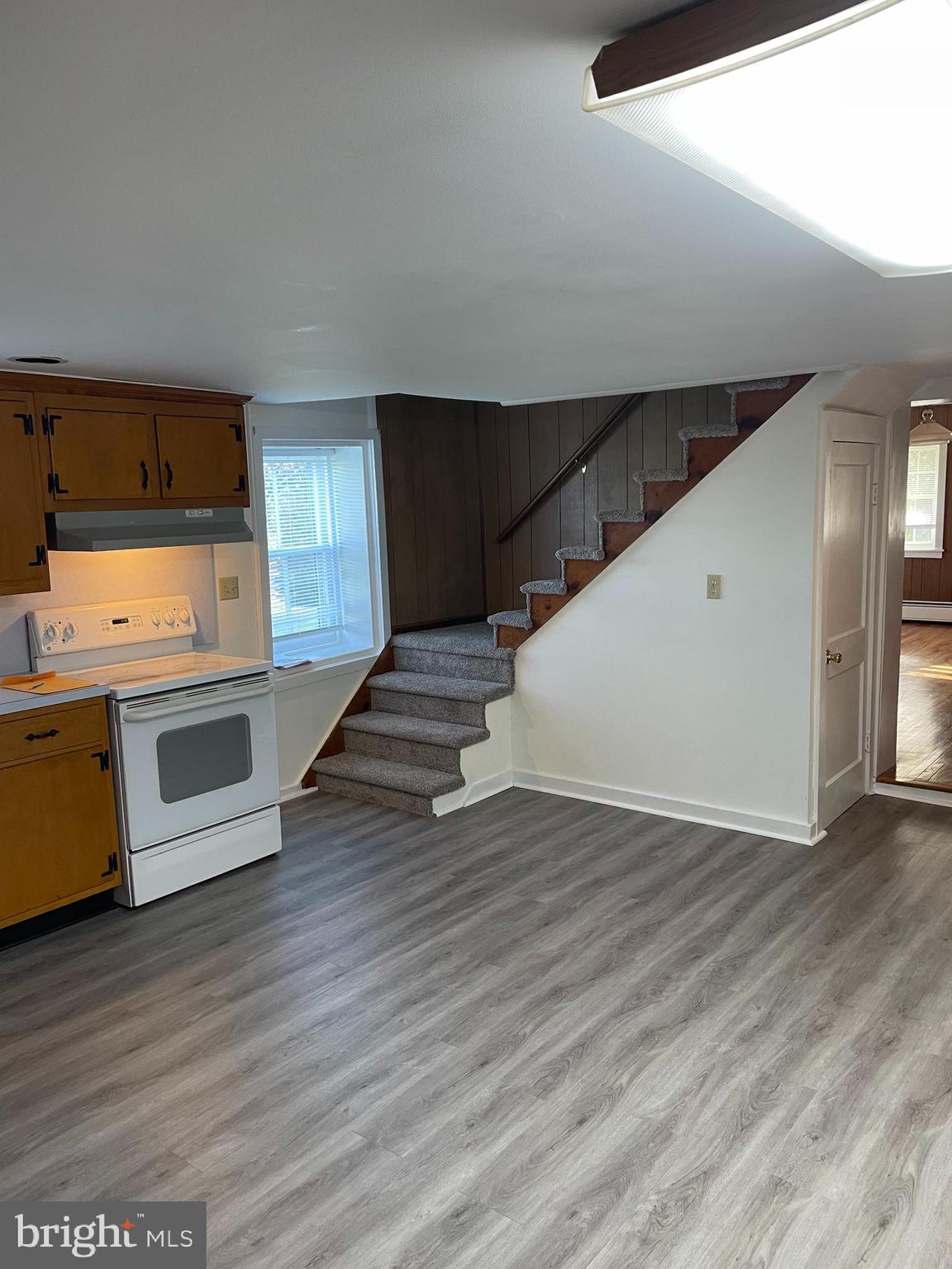 10524 Stull Road Thurmont, MD 21788 - Photo 63 of 91 a view of a kitchen with wooden floor and electronic appliances