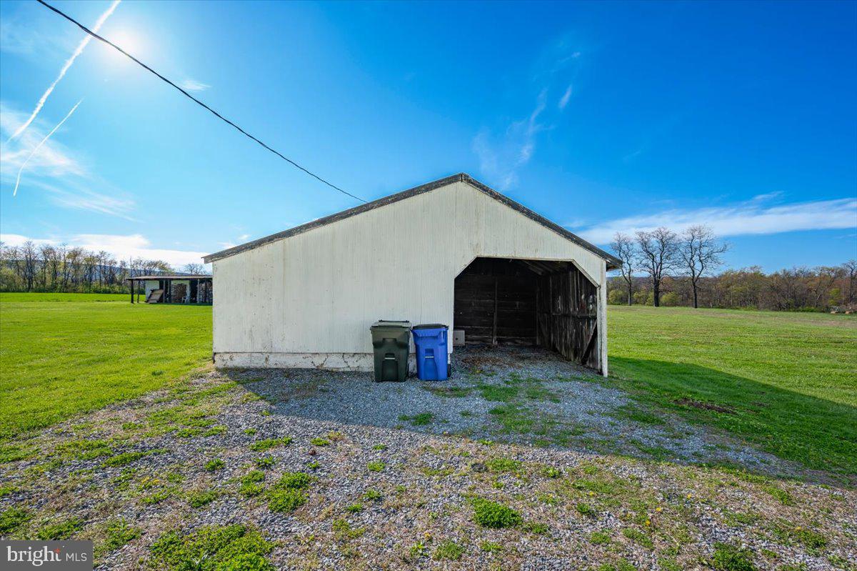 10524 Stull Road Thurmont, MD 21788 - Photo 9 of 91 a front view of a house with garden