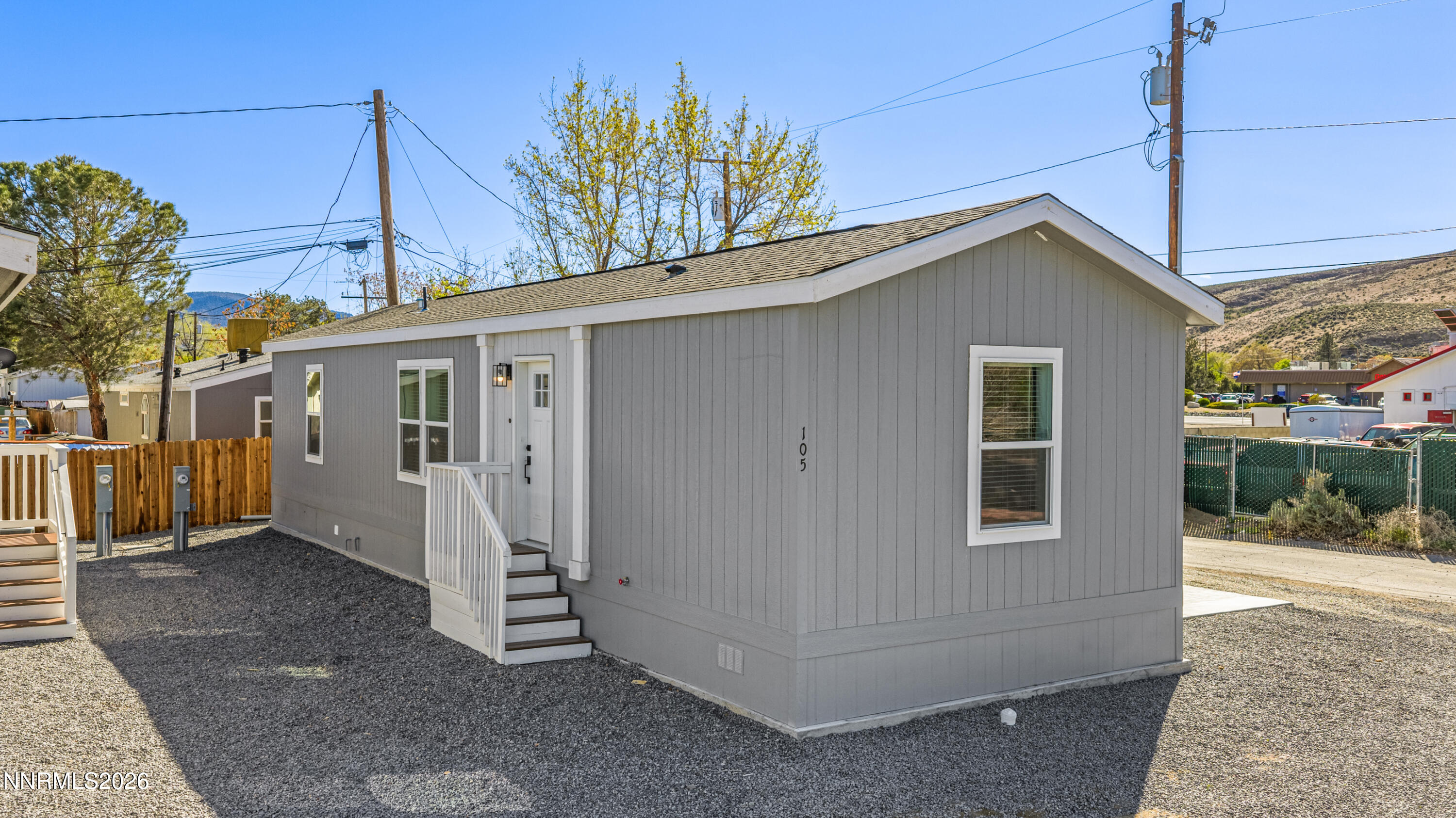 105 Fireman Row Dayton, NV 89403 - Photo 1 of 16 a backyard of a house