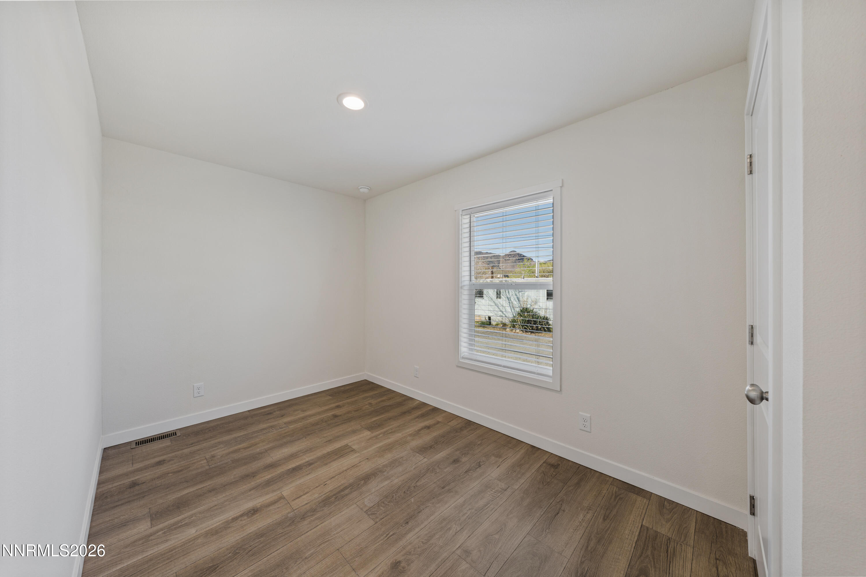 105 Fireman Row Dayton, NV 89403 - Photo 11 of 16 an empty room with a window