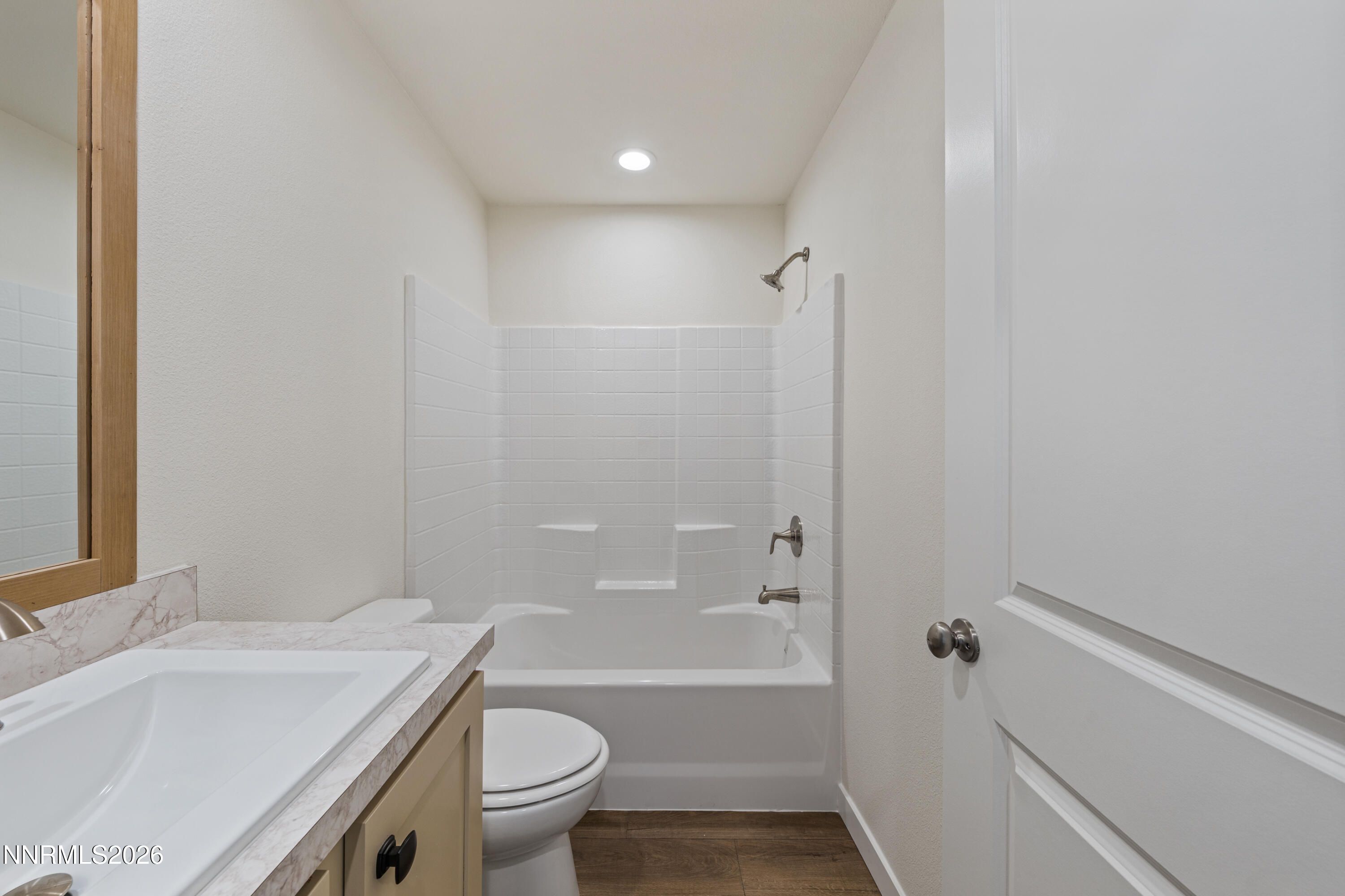 105 Fireman Row Dayton, NV 89403 - Photo 15 of 16 a bathroom with a sink a toilet and shower