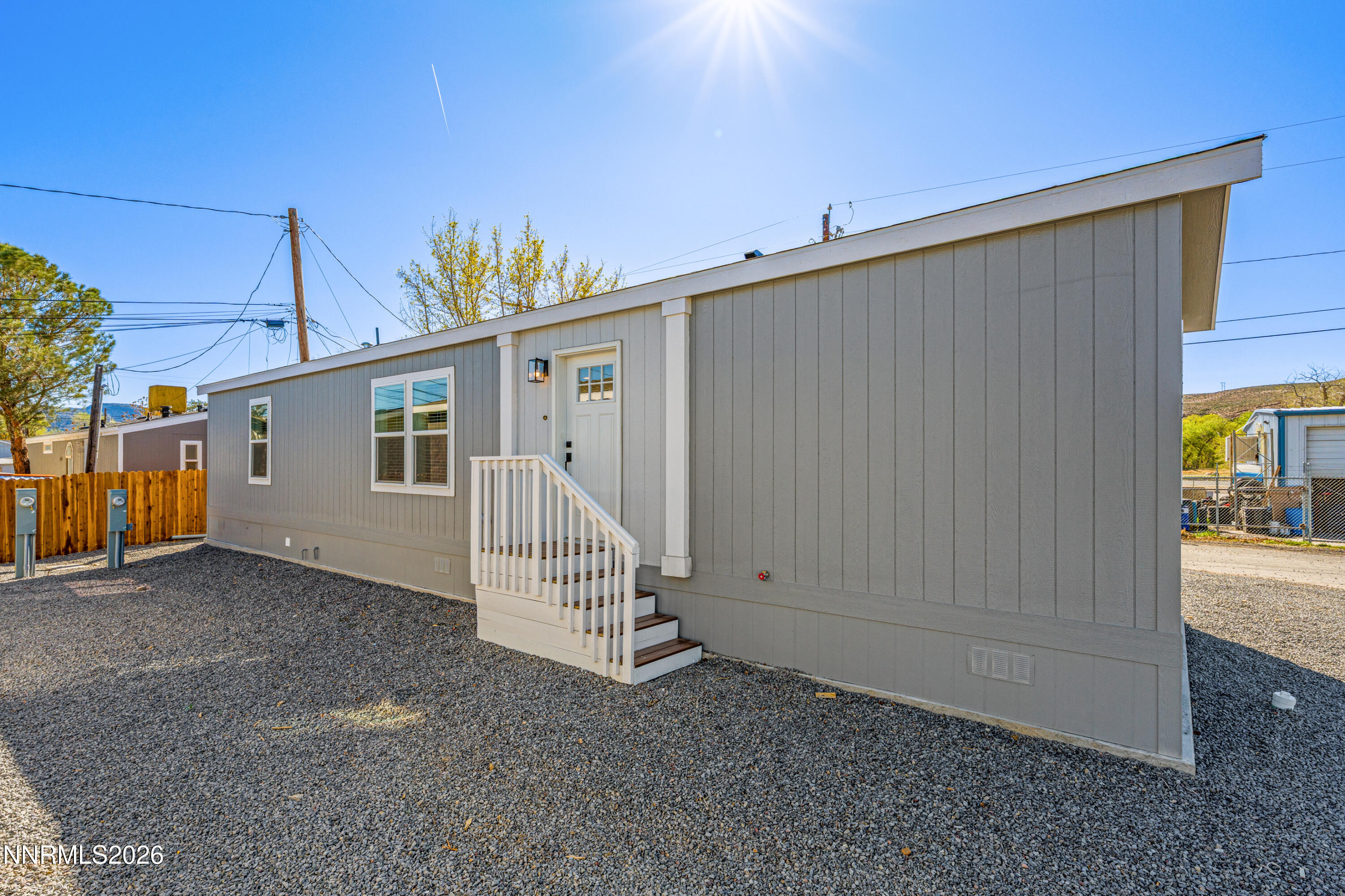 105 Fireman Row Dayton, NV 89403 - Photo 16 of 16 a view of a house with backyard