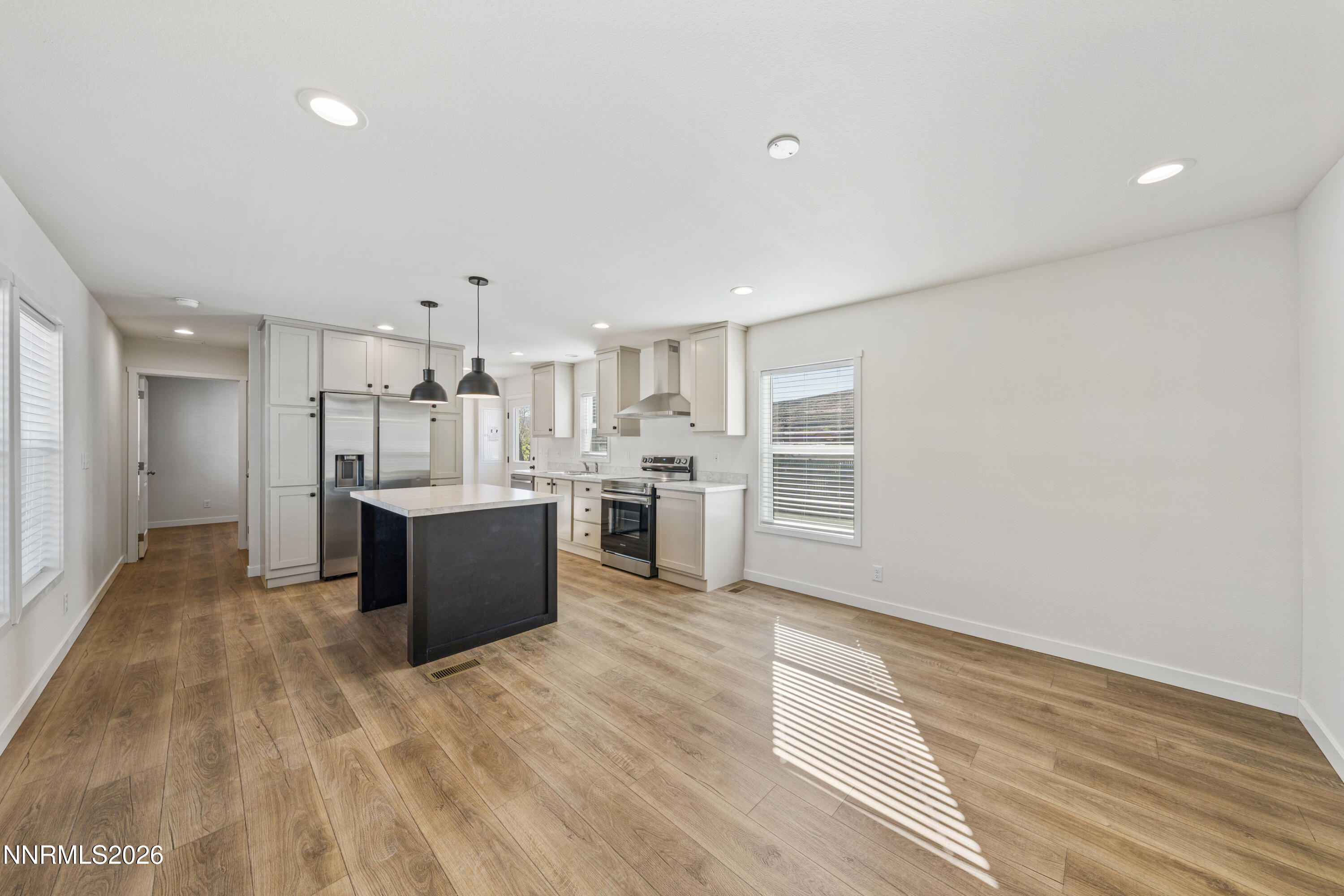 105 Fireman Row Dayton, NV 89403 - Photo 8 of 16 a view of kitchen with wooden floor