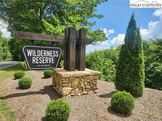 a sign on the side of the road