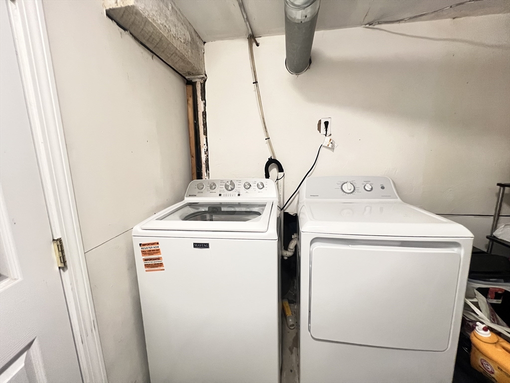 78 Addison Street, Unit B Chelsea, MA 02150 - Photo 13 of 13 a utility room with dryer and washer