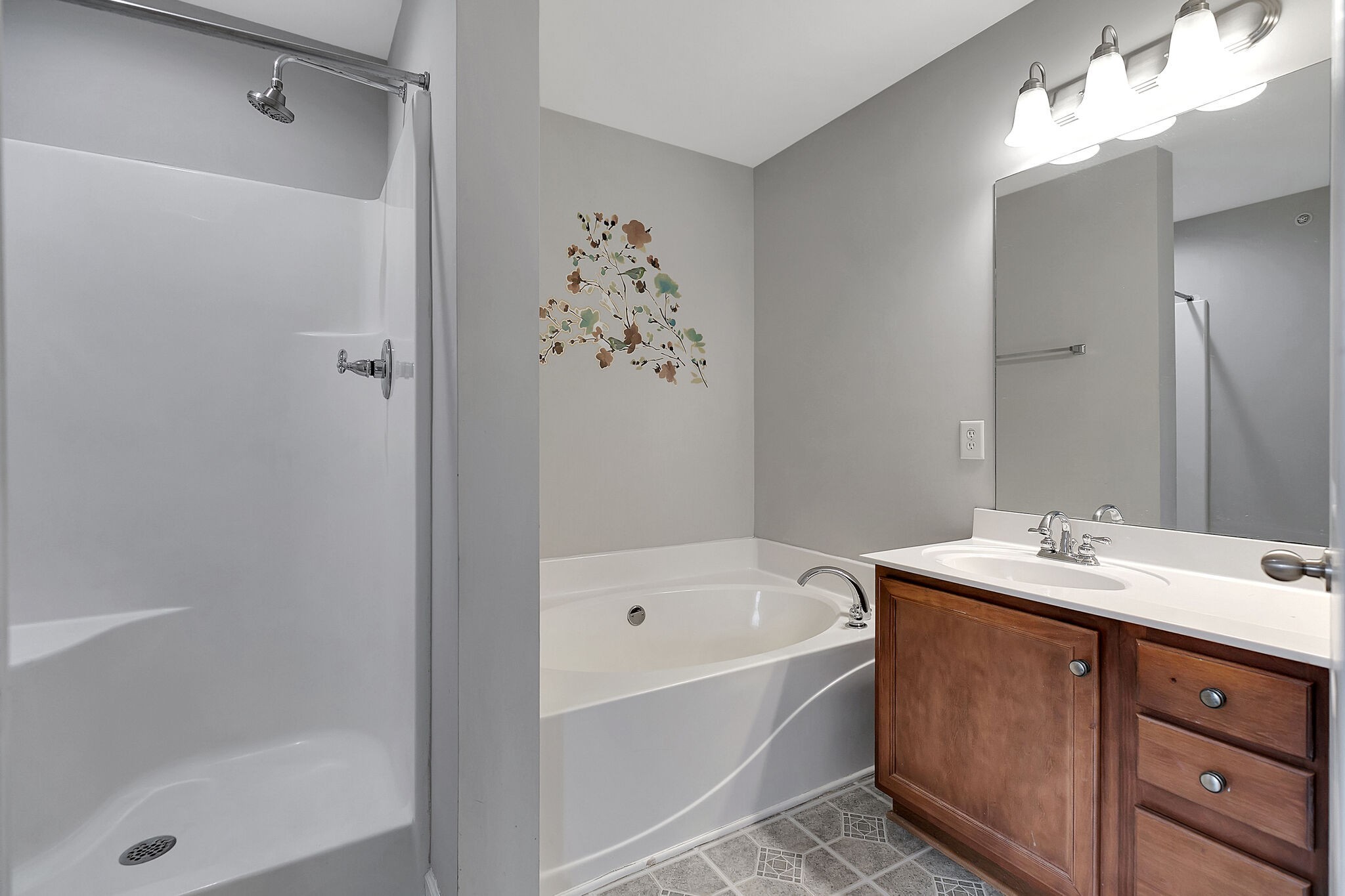 4013 Clinton Lane Spring Hill, TN 37174 - Photo 20 of 27 a bathroom with a tub sink and mirror