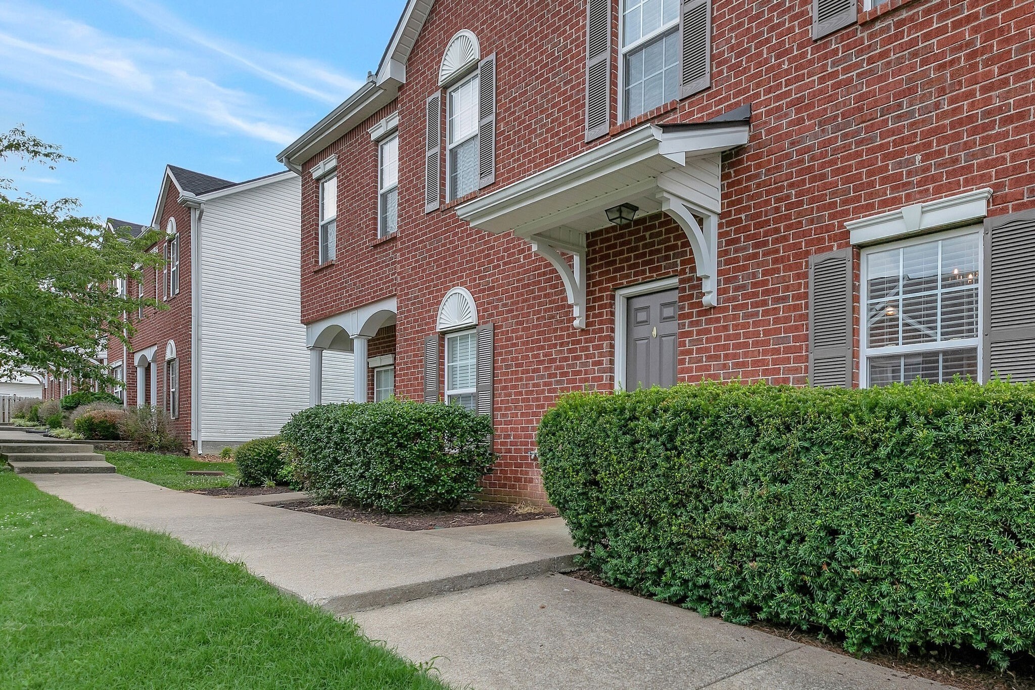 4013 Clinton Lane Spring Hill, TN 37174 - Photo 2 of 27 a front view of a house with a garden