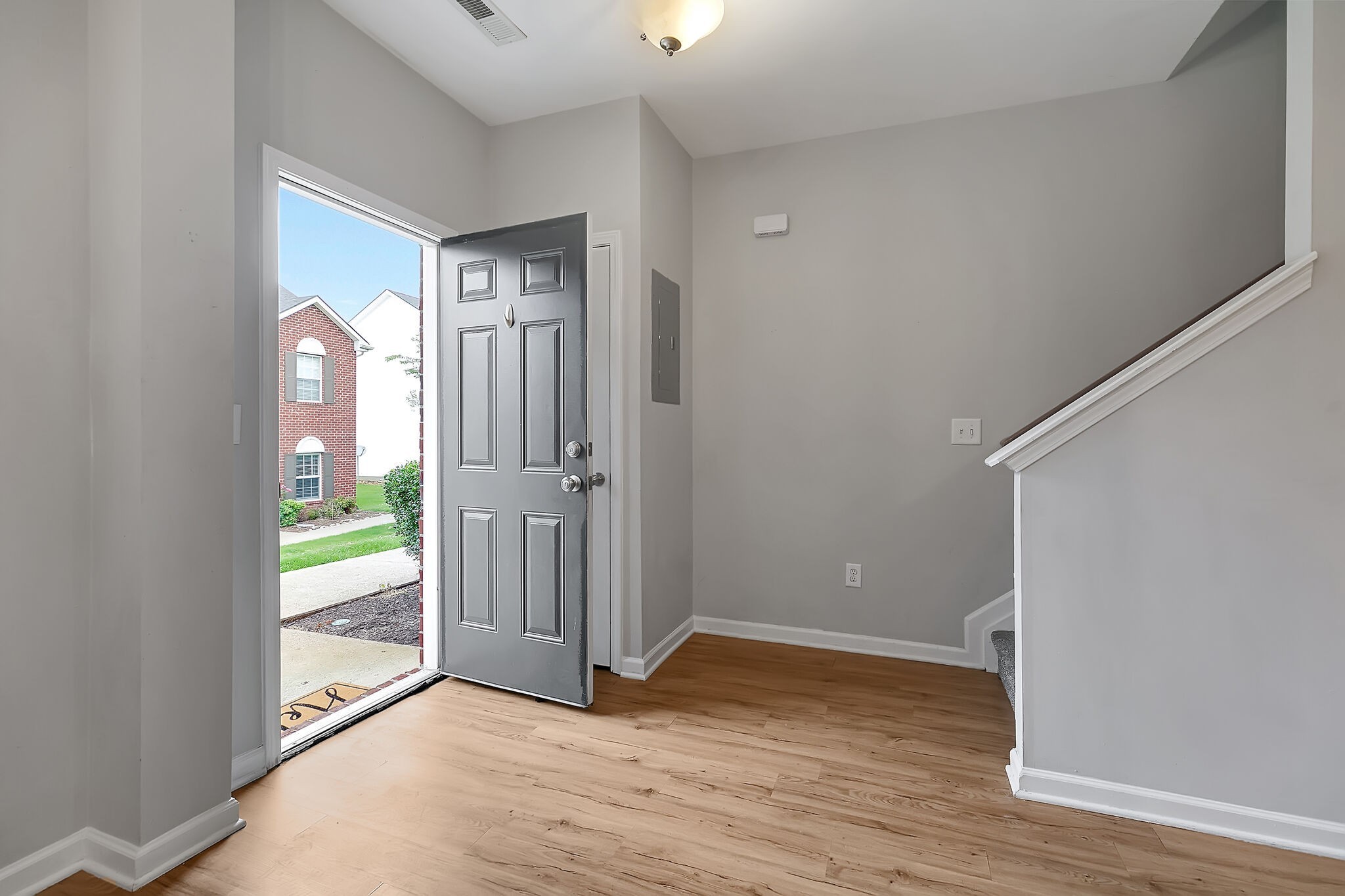 4013 Clinton Lane Spring Hill, TN 37174 - Photo 3 of 27 a view of an entryway with wooden floor and door