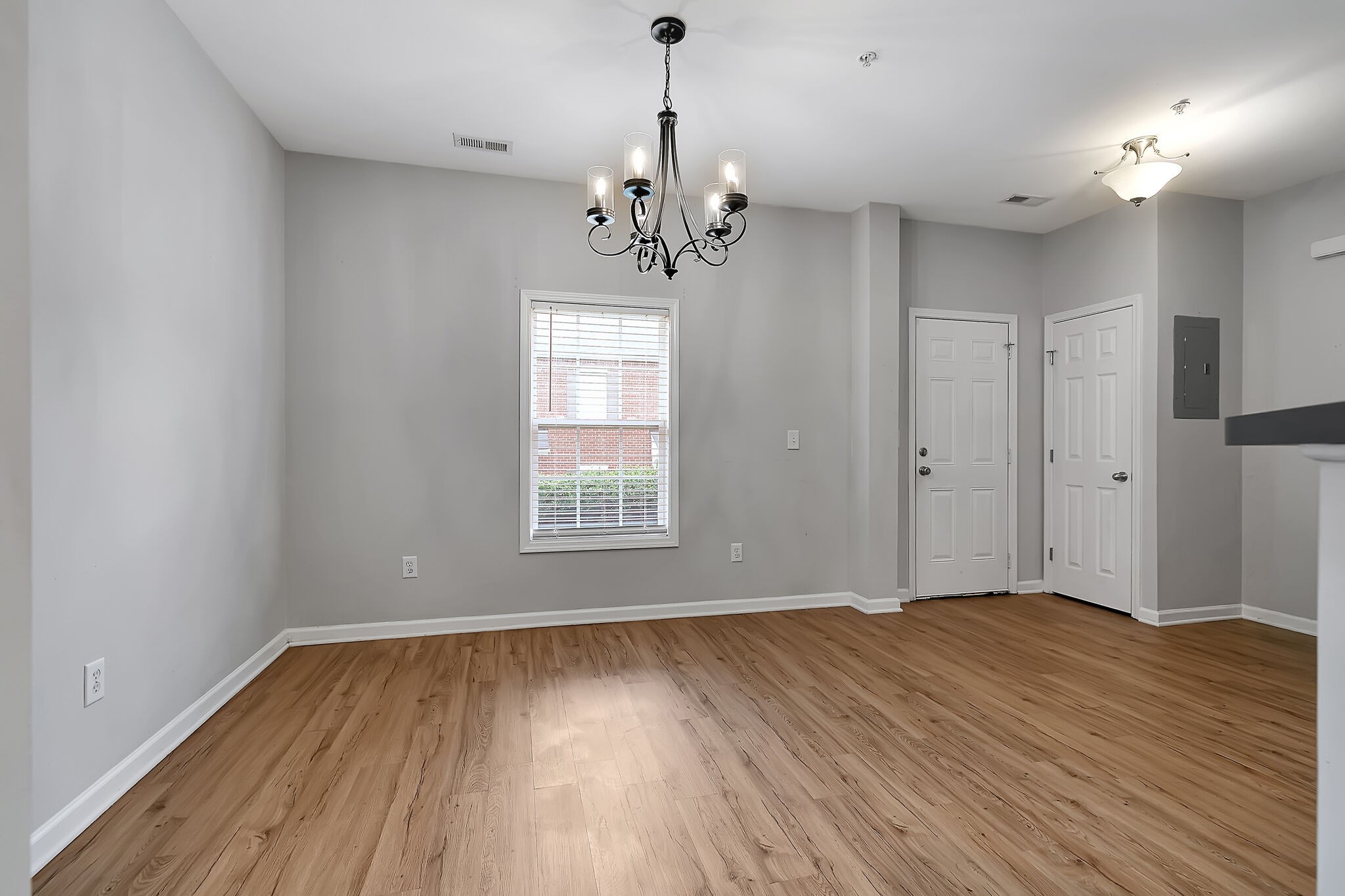 4013 Clinton Lane Spring Hill, TN 37174 - Photo 6 of 27 a view of an empty room with wooden floor and a window