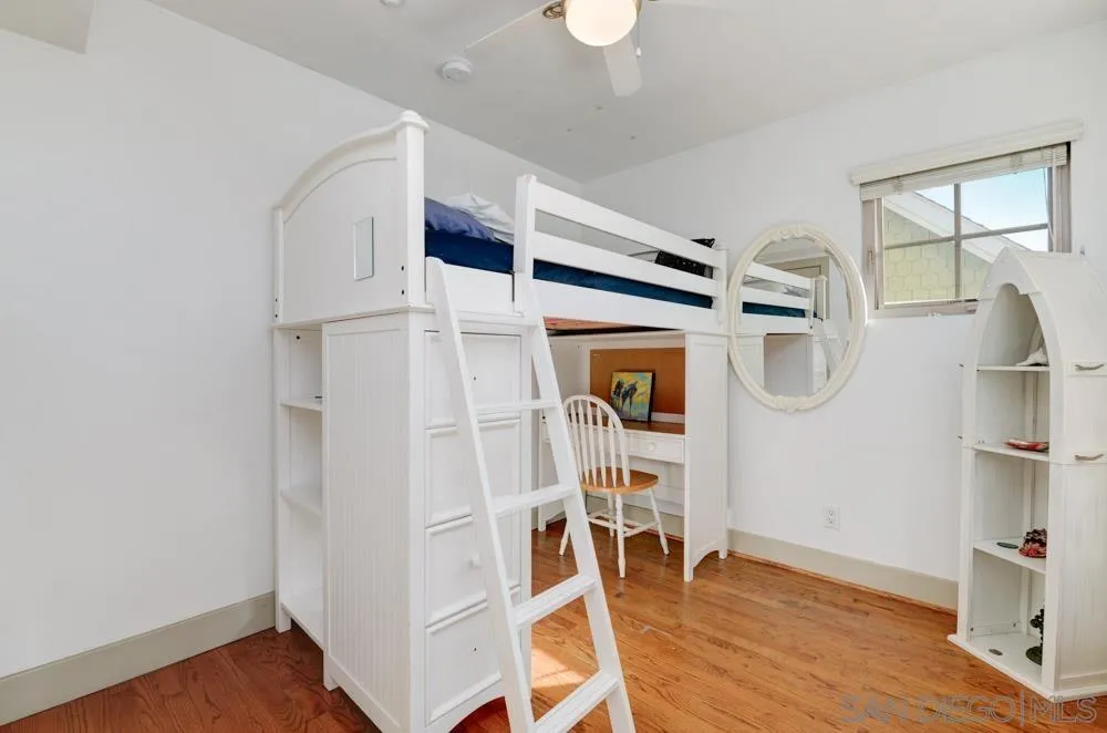 445 E Avenue Coronado, CA 92118 - Photo 12 of 25 a view of walk in closet with empty racks