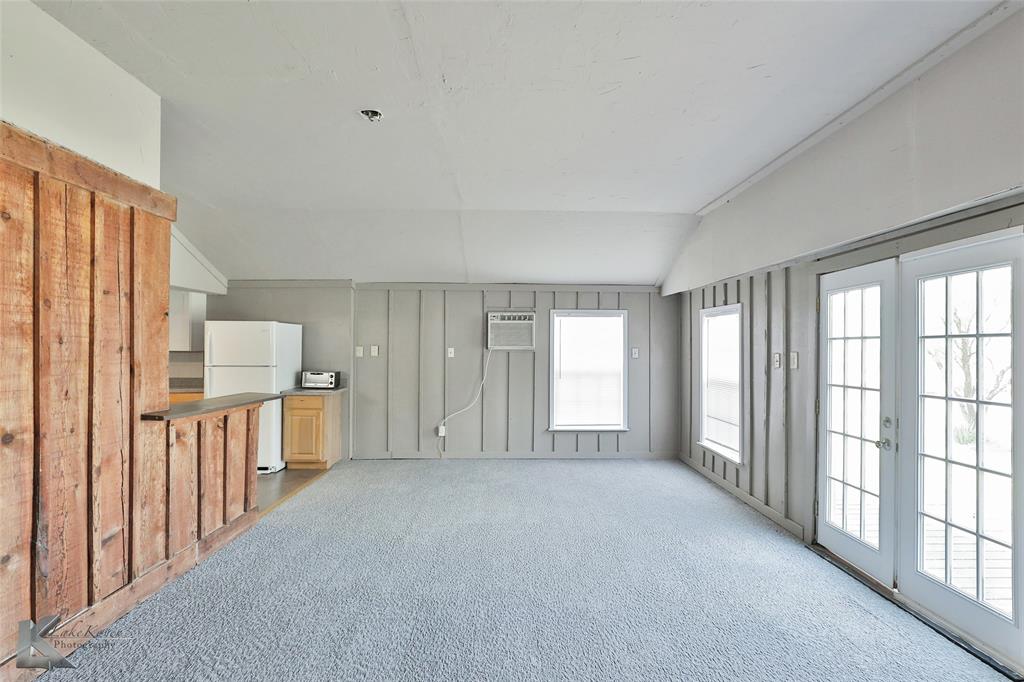377 Grisham Road Haskell, TX 79521 - Photo 18 of 37 a view of an empty room with a window