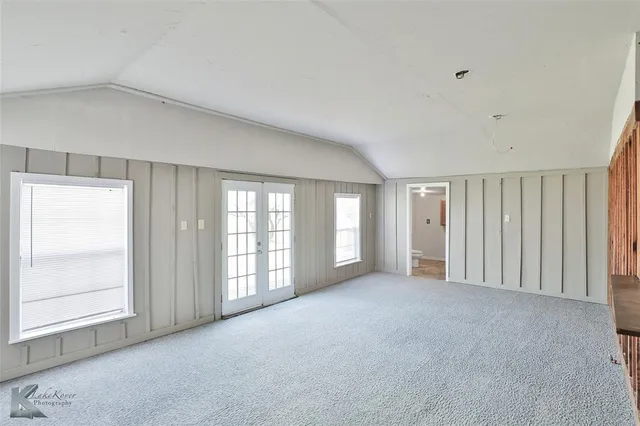 a view of a livingroom with a staircase