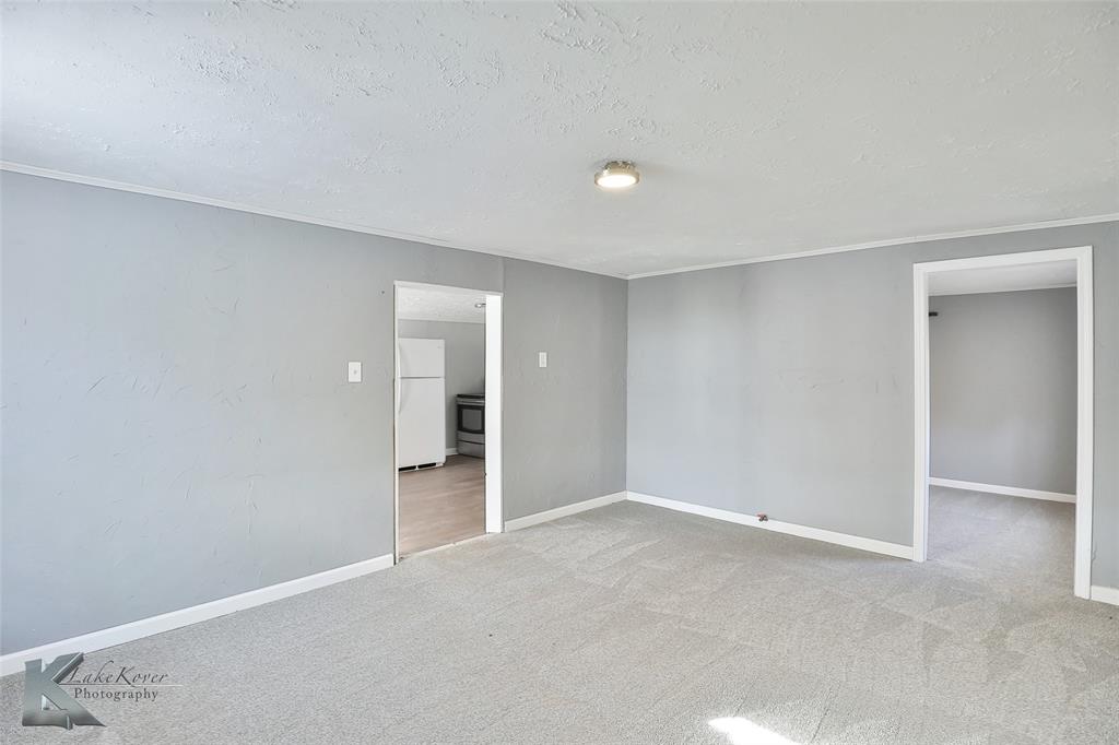 377 Grisham Road Haskell, TX 79521 - Photo 26 of 37 wooden floor in an empty room