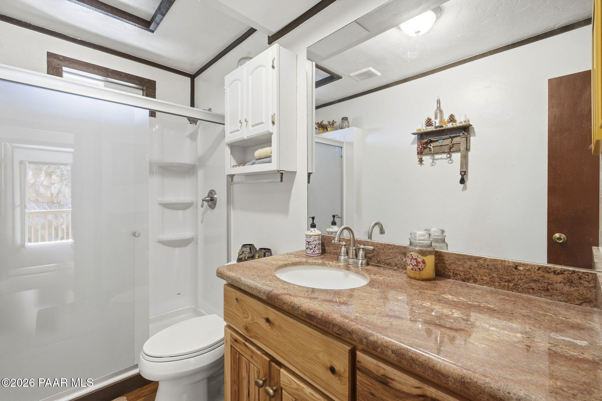 7251 South Big Bug Mesa Road Mayer, AZ 86333 - Photo 25 of 55 a bathroom with a granite countertop sink toilet and shower