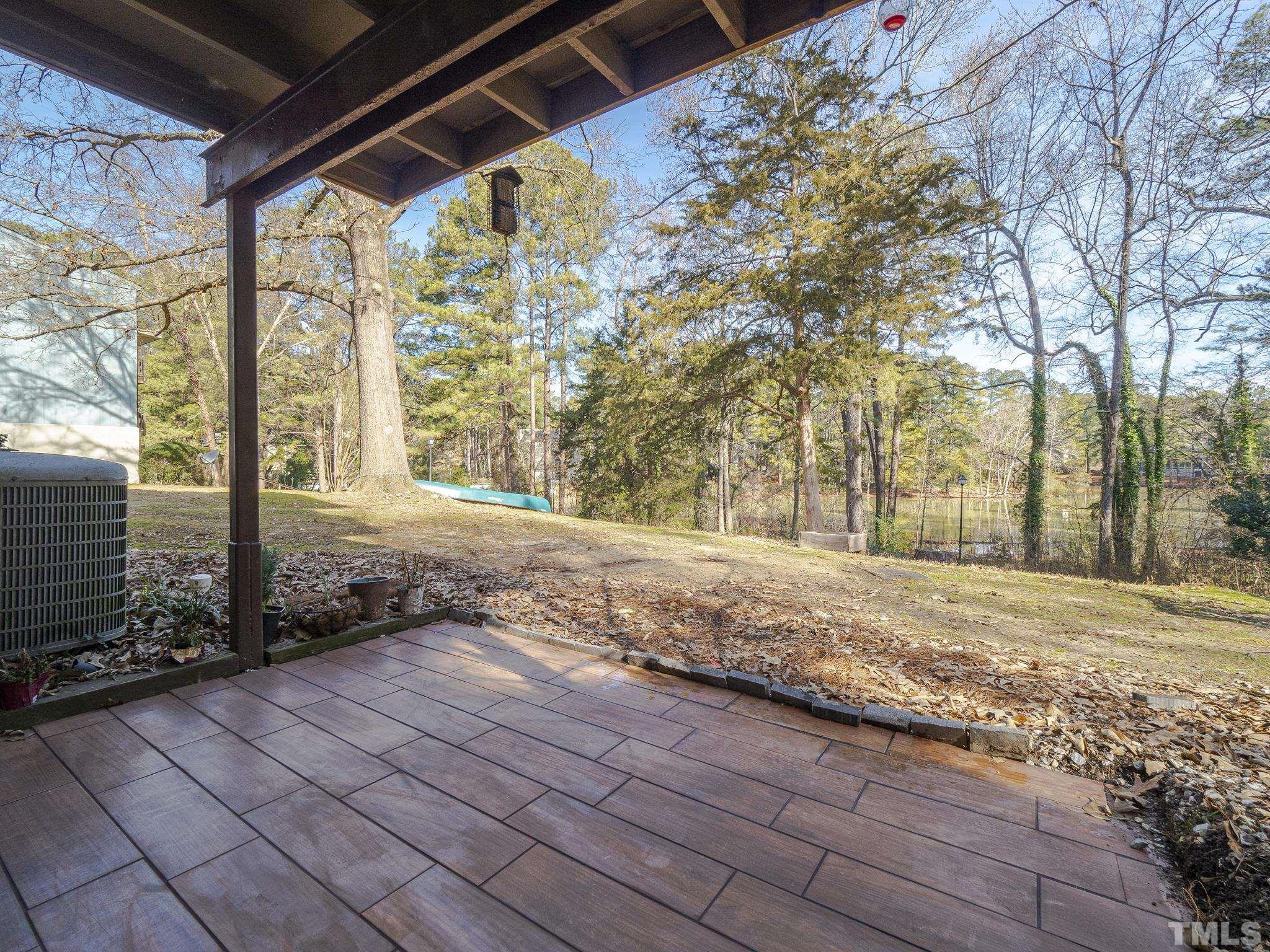 5072 Flint Ridge Place, Unit 5072 Raleigh, NC 27609 - Photo 17 of 18 a view of a backyard of the house