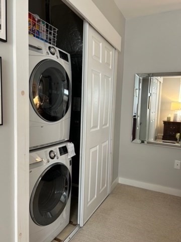 45 Main Street, Unit 221 Wareham, MA 02571 - Photo 16 of 36 a view of a hallway with washer and dryer