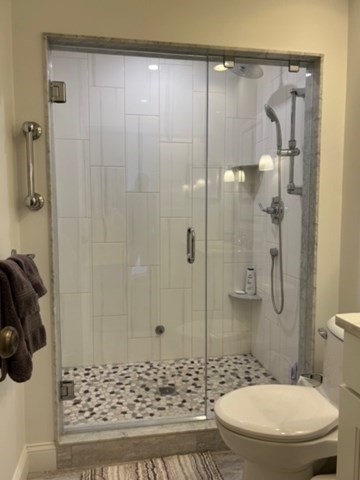 45 Main Street, Unit 221 Wareham, MA 02571 - Photo 17 of 36 a bathroom with a toilet and shower