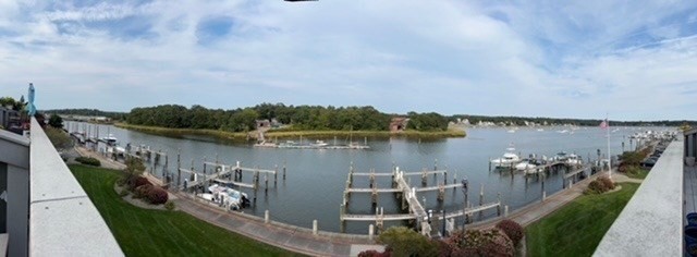 45 Main Street, Unit 221 Wareham, MA 02571 - Photo 2 of 36 a view of a lake with a mountain in the background