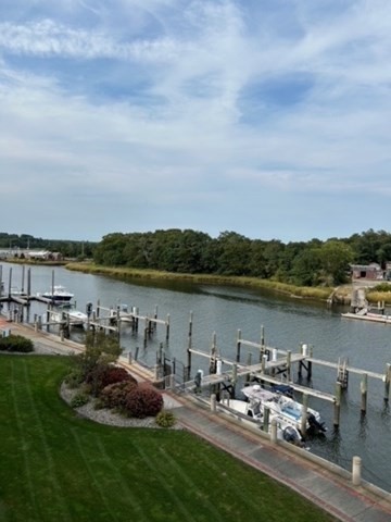 45 Main Street, Unit 221 Wareham, MA 02571 - Photo 34 of 36 a view of a lake with houses in the back