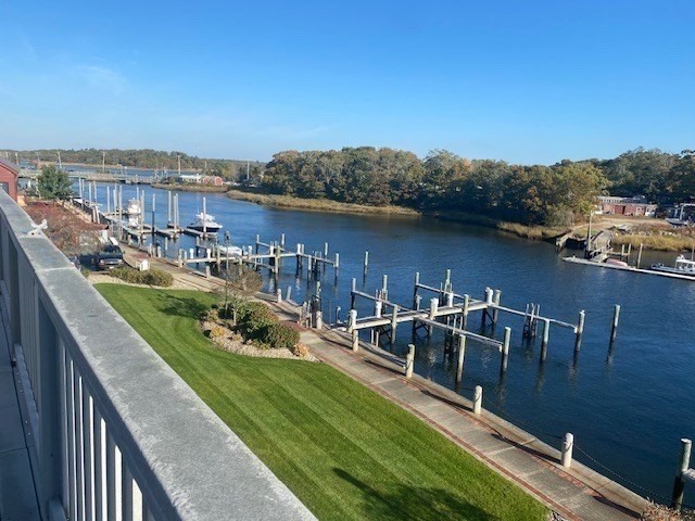 45 Main Street, Unit 221 Wareham, MA 02571 - Photo 36 of 36 a view of a terrace with lawn chairs