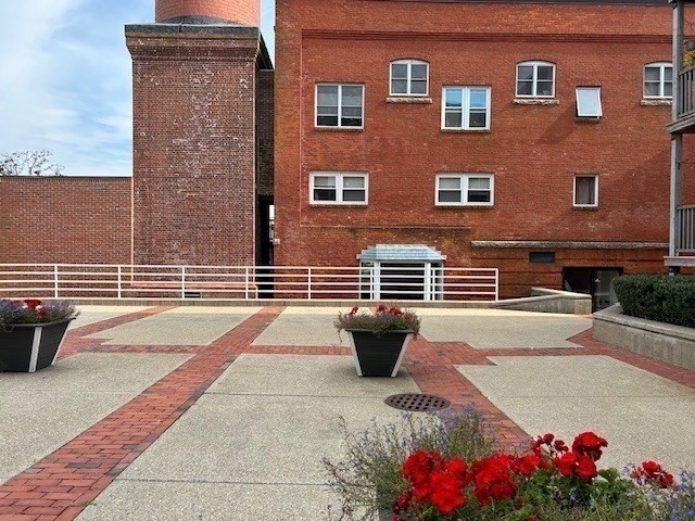 45 Main Street, Unit 221 Wareham, MA 02571 - Photo 4 of 36 a view of building with outdoor space