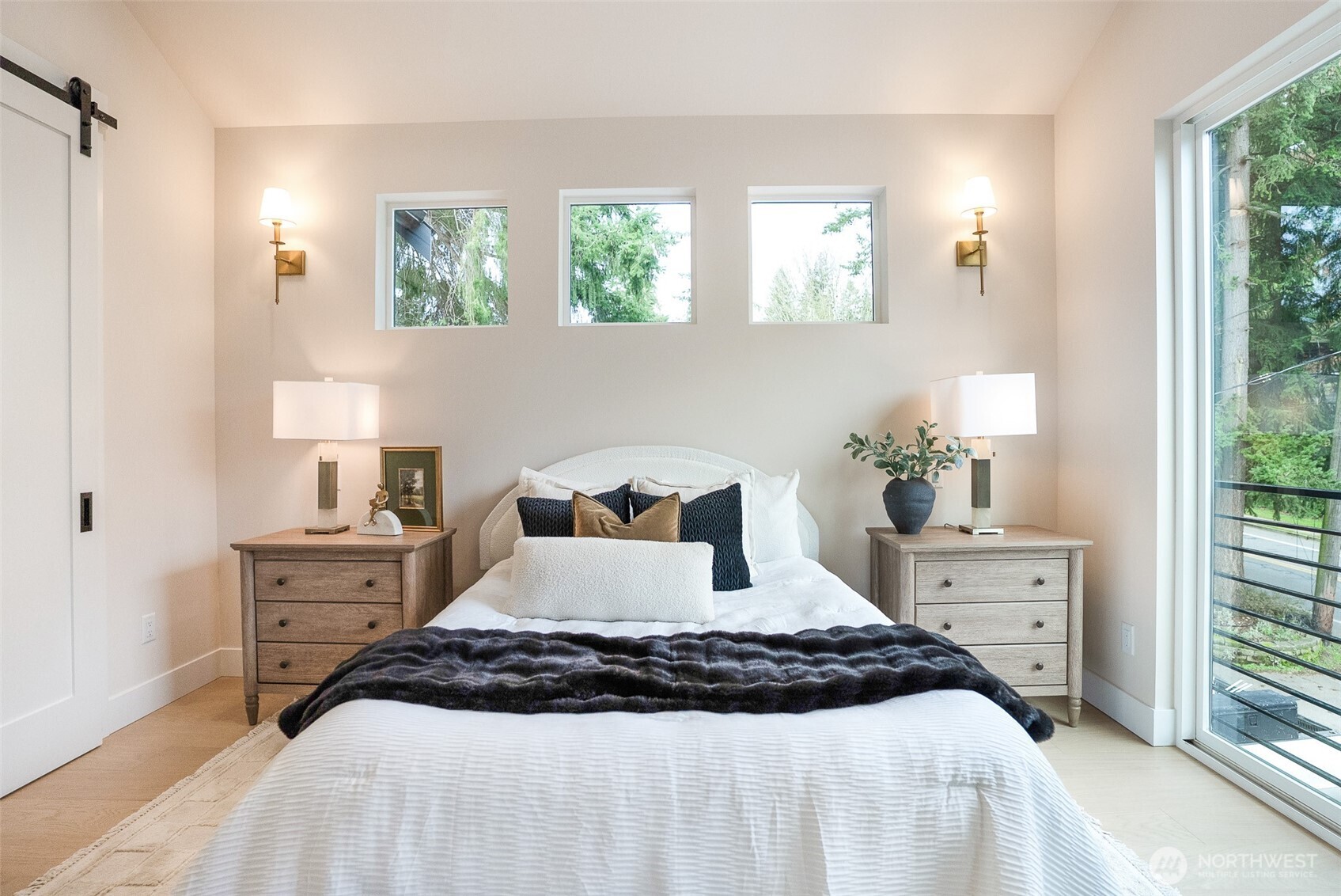 18607 104th Avenue Northeast, Unit B Bothell, WA 98011 - Photo 22 of 29 a bedroom with a large bed and a window