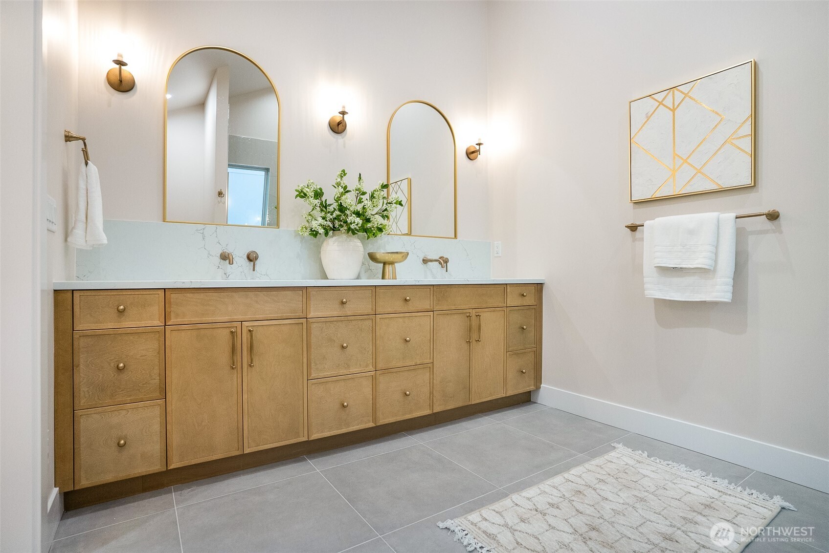 18607 104th Avenue Northeast, Unit B Bothell, WA 98011 - Photo 25 of 29 a bathroom with a double vanity sink and a mirror