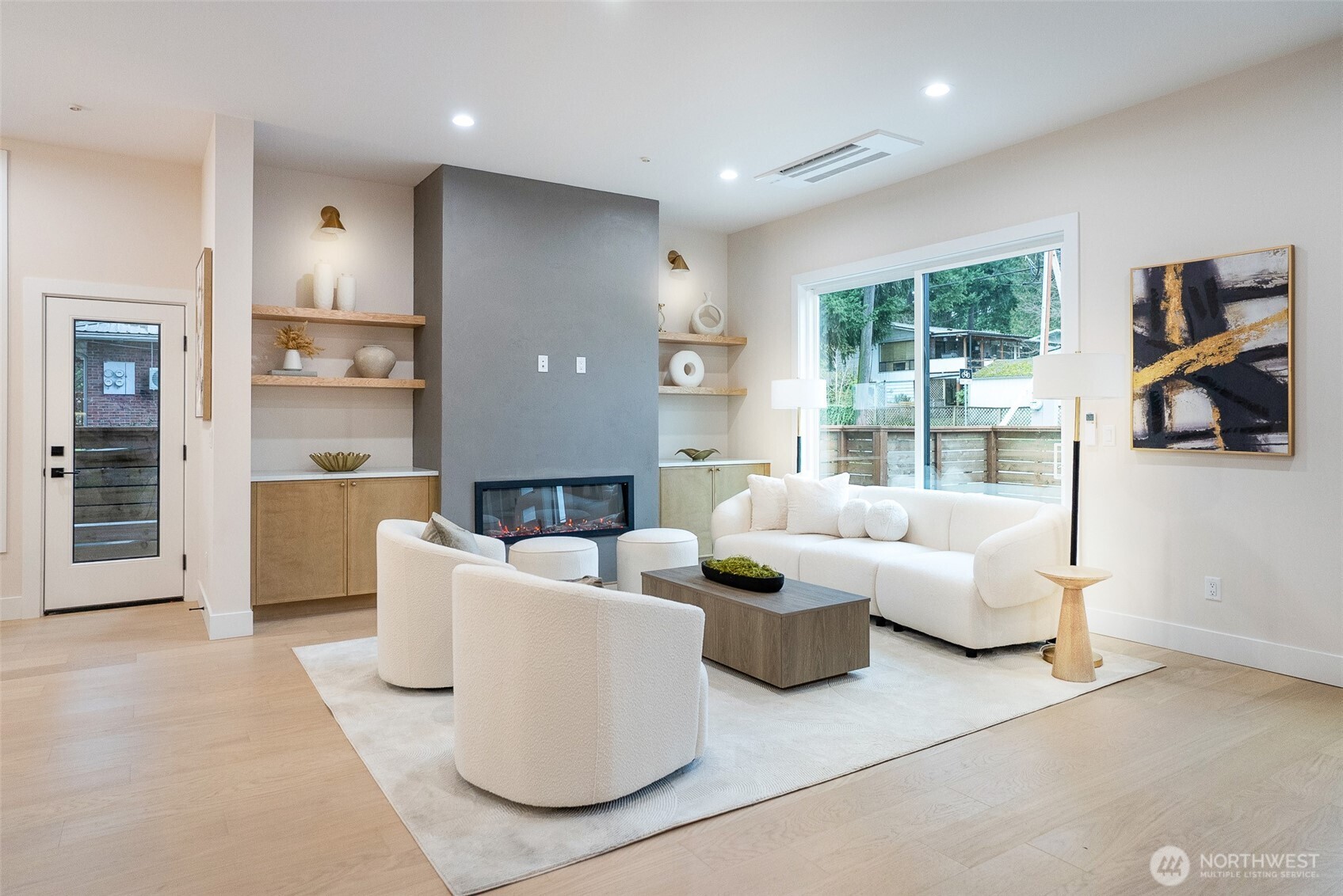18607 104th Avenue Northeast, Unit B Bothell, WA 98011 - Photo 5 of 29 a living room with fireplace furniture and a large window