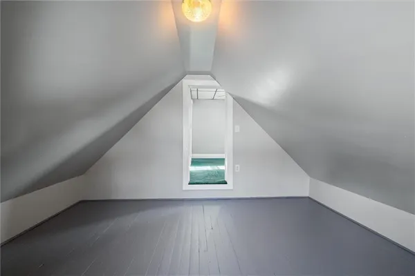 a view of a hallway with a window