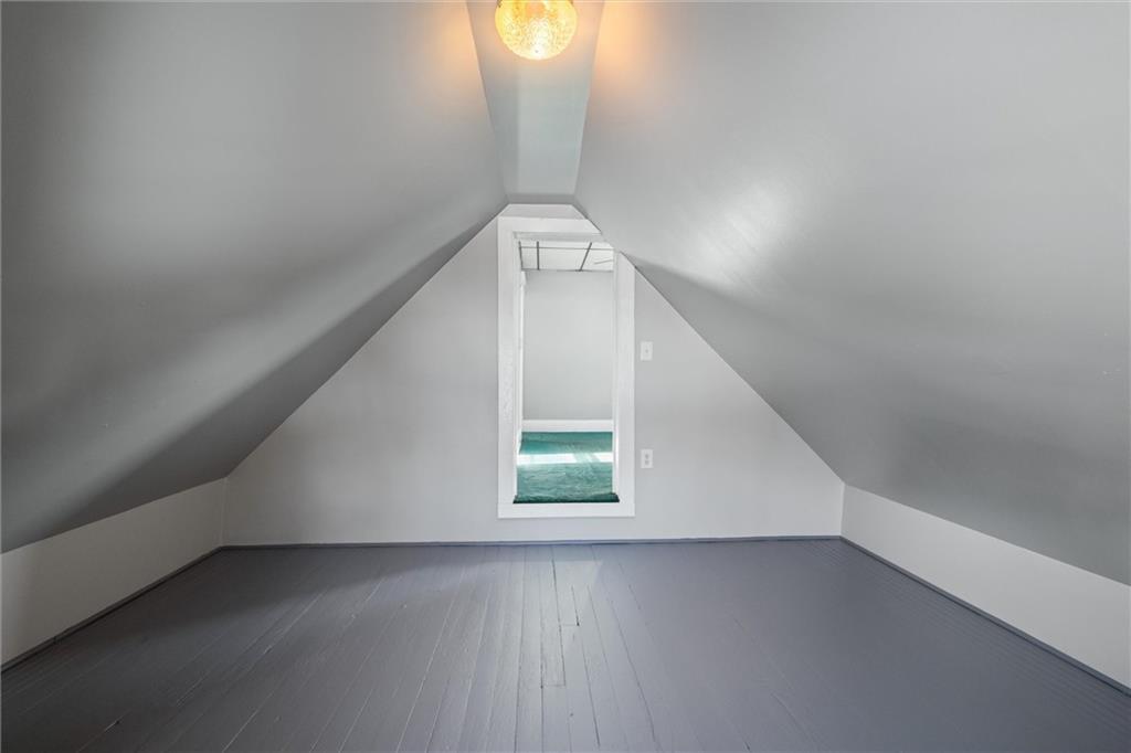 768 Baldwin Avenue Sharon, PA 16146 - Photo 11 of 13 a view of a hallway with a window