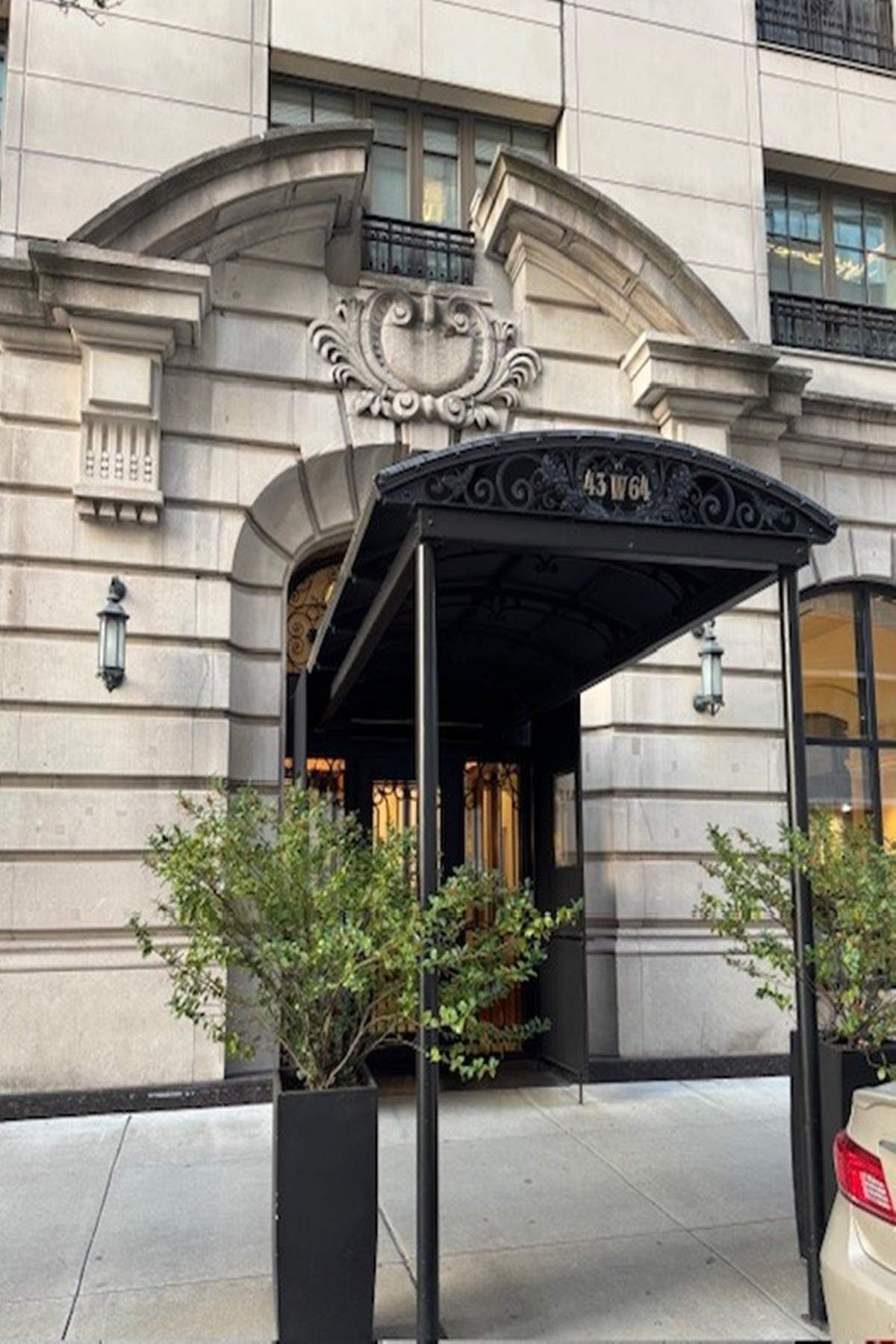 43 West 64th Street, Unit 4B Manhattan, NY 10023 - Photo 13 of 15 a view of garage with a car parked