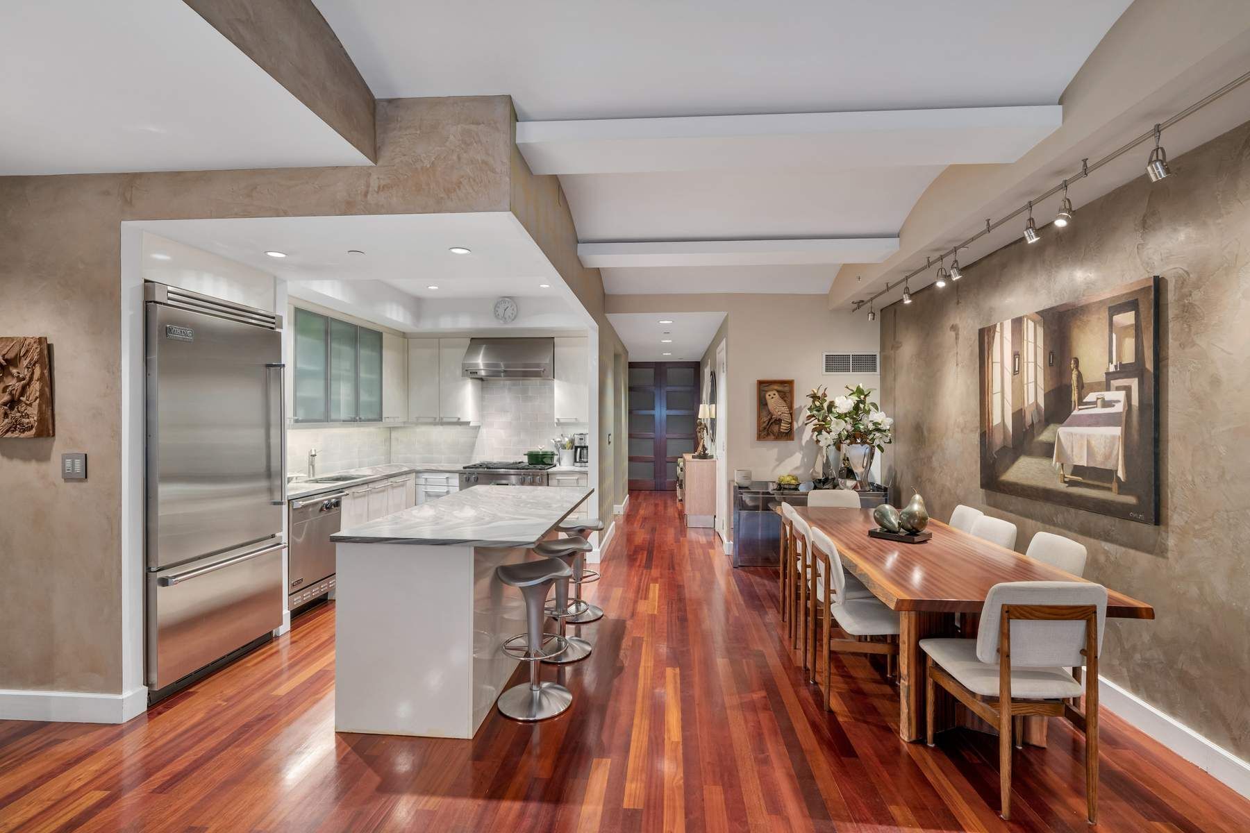 43 West 64th Street, Unit 4B Manhattan, NY 10023 - Photo 3 of 15 a view of a dining room with furniture and wooden floor