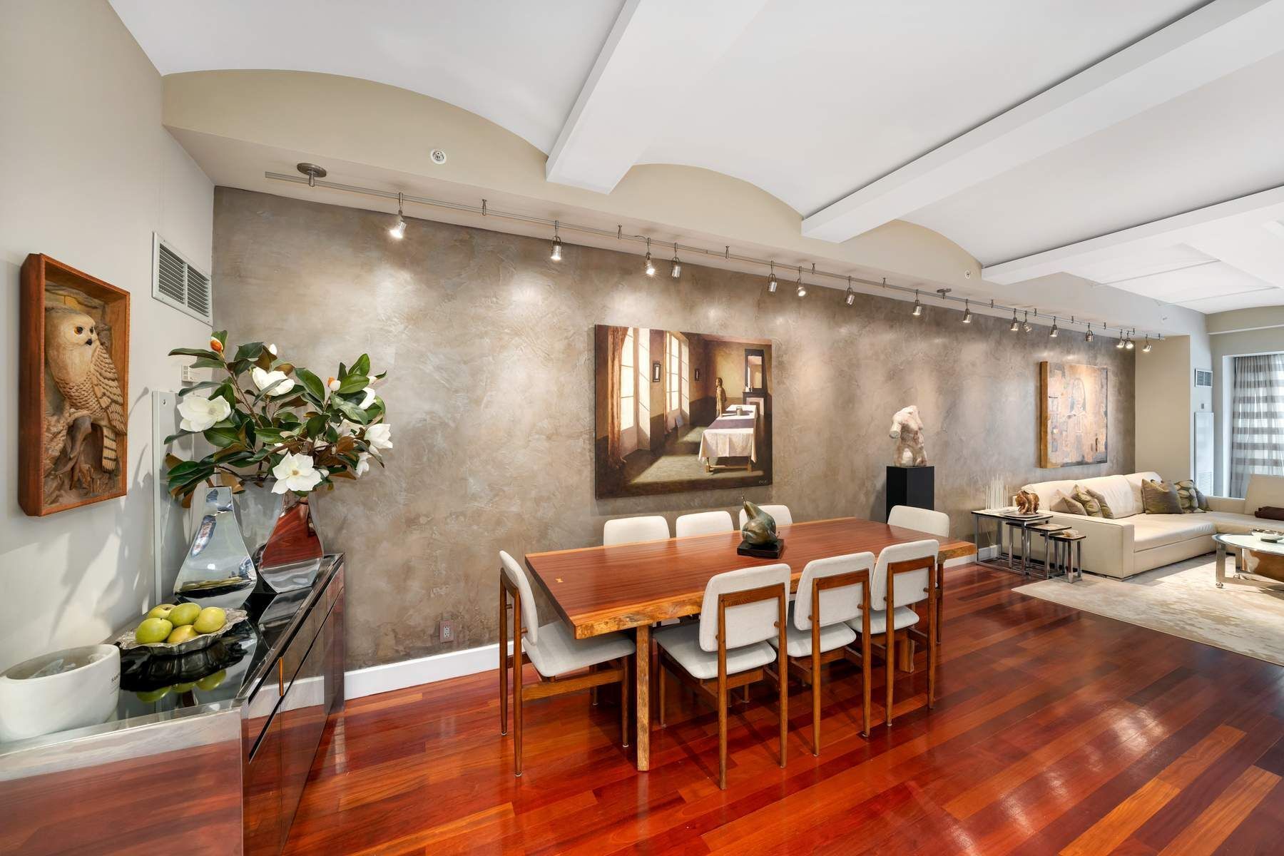 43 West 64th Street, Unit 4B Manhattan, NY 10023 - Photo 5 of 15 a view of a dining room with furniture and wooden floor