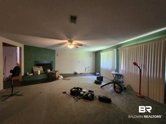 32749 Antietam Road Lillian, AL 36549 - Photo 17 of 47 Interior space featuring ceiling fan and carpet floors