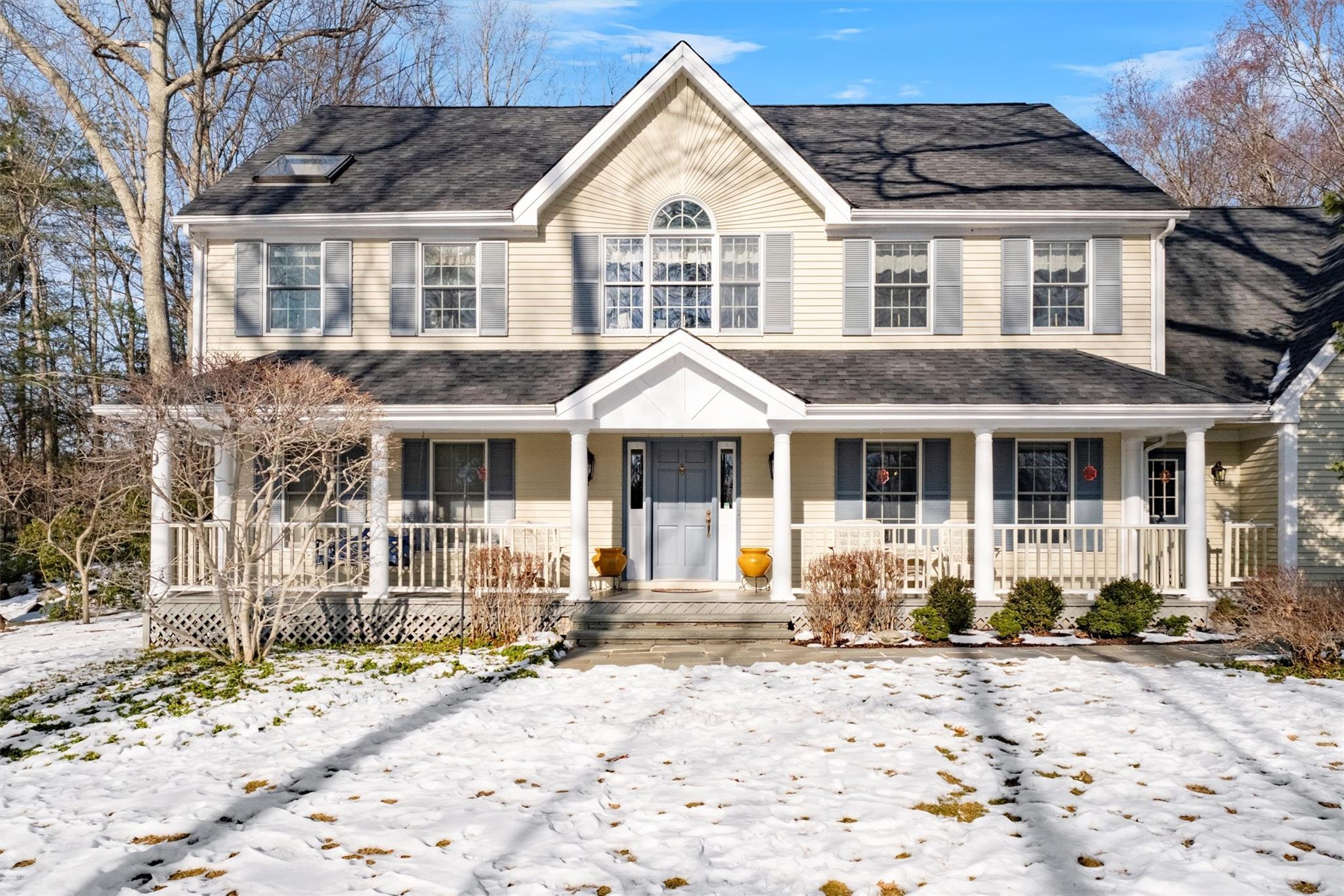 View of front of house with covered porch