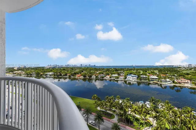 a view of a lake with a city