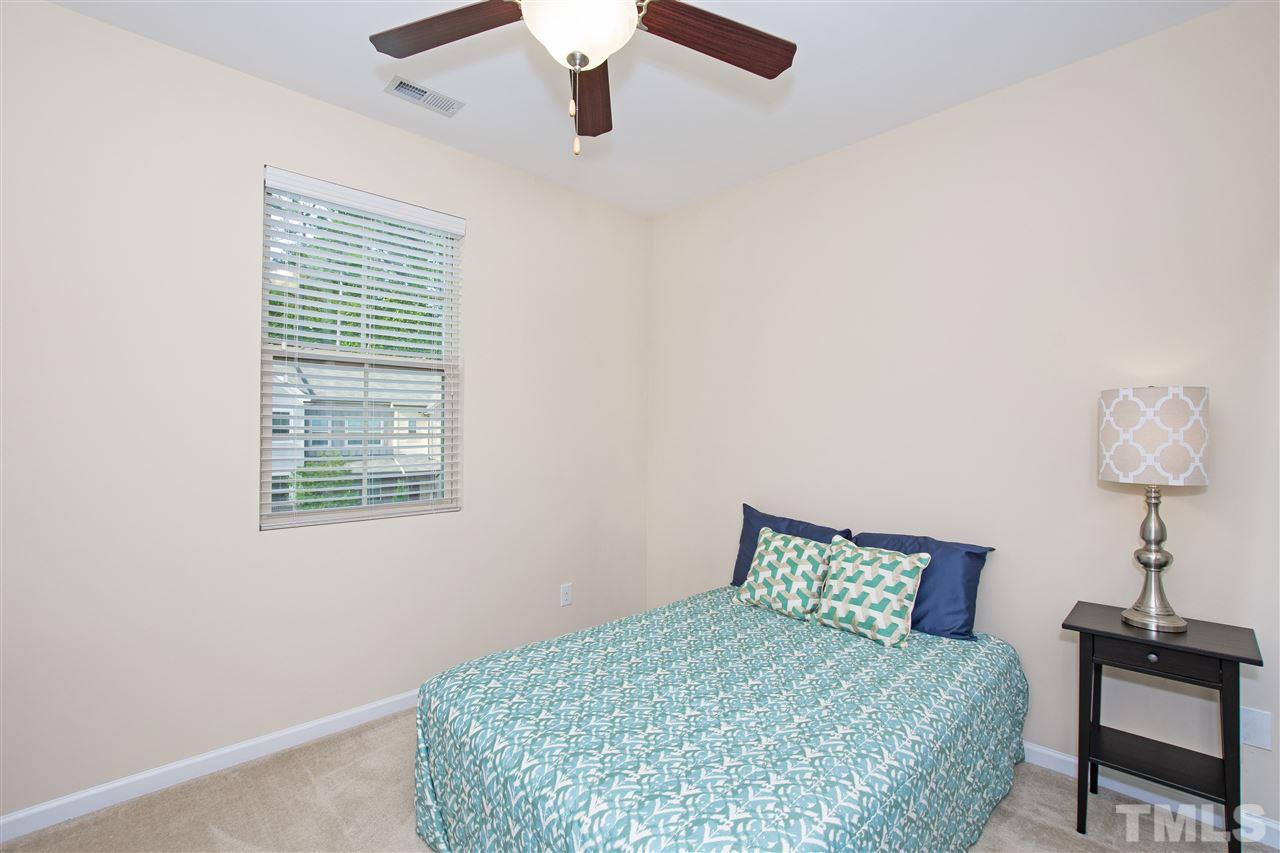 725 Wickham Ridge Road Apex, NC 27539 - Photo 18 of 30 Spacious Secondary Bedroom with Walk-in Closet