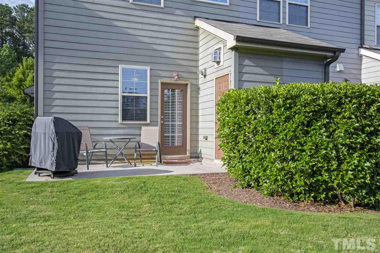 725 Wickham Ridge Road Apex, NC 27539 - Photo 23 of 30 Private Back Patio with Storage Closet