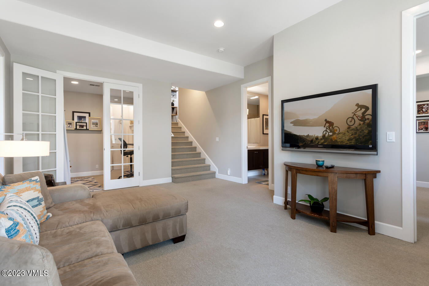 68 Hackamore Road Edwards, CO 81632 - Photo 11 of 22 a living room with furniture and a flat screen tv