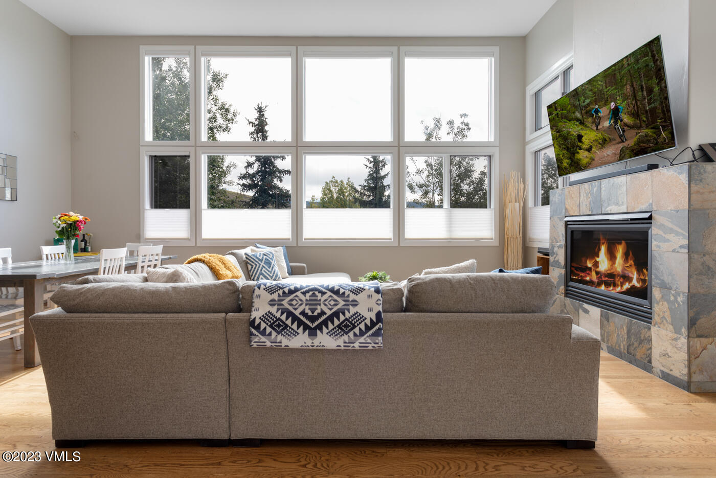 68 Hackamore Road Edwards, CO 81632 - Photo 3 of 22 a living room with furniture a flat screen tv and a large window