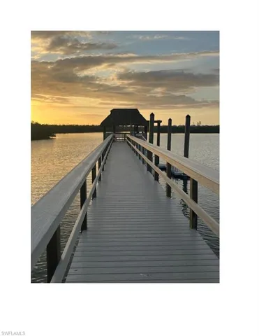 a black and white photo of a living room