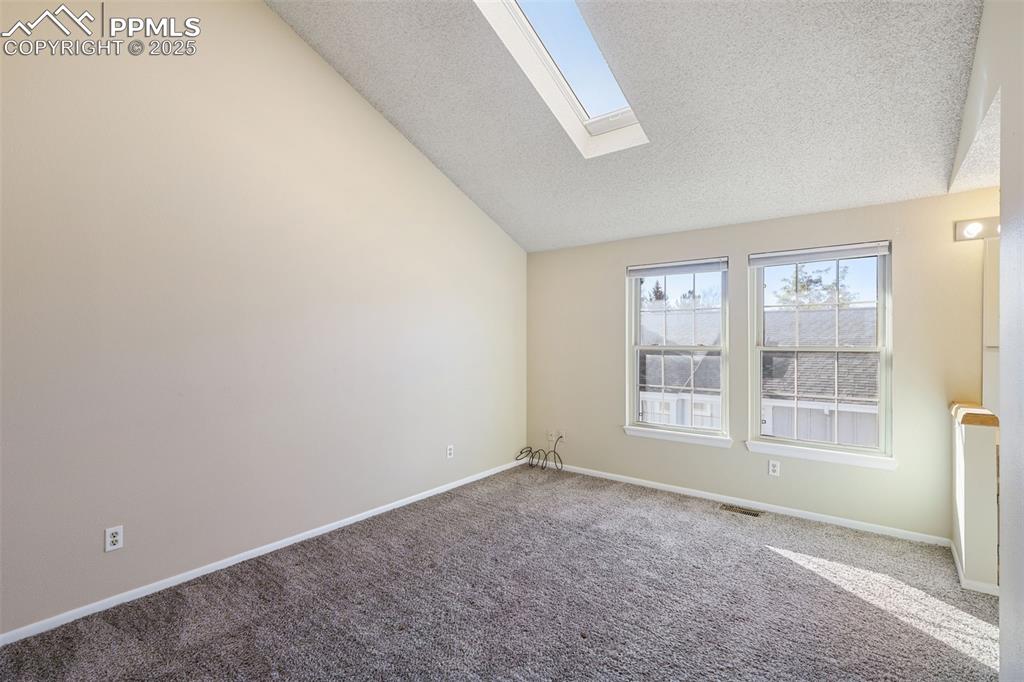 2575 Hatch Circle Colorado Springs, CO 80918 - Photo 18 of 39 an empty room with a window