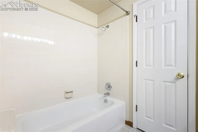 a bathroom with a bathtub