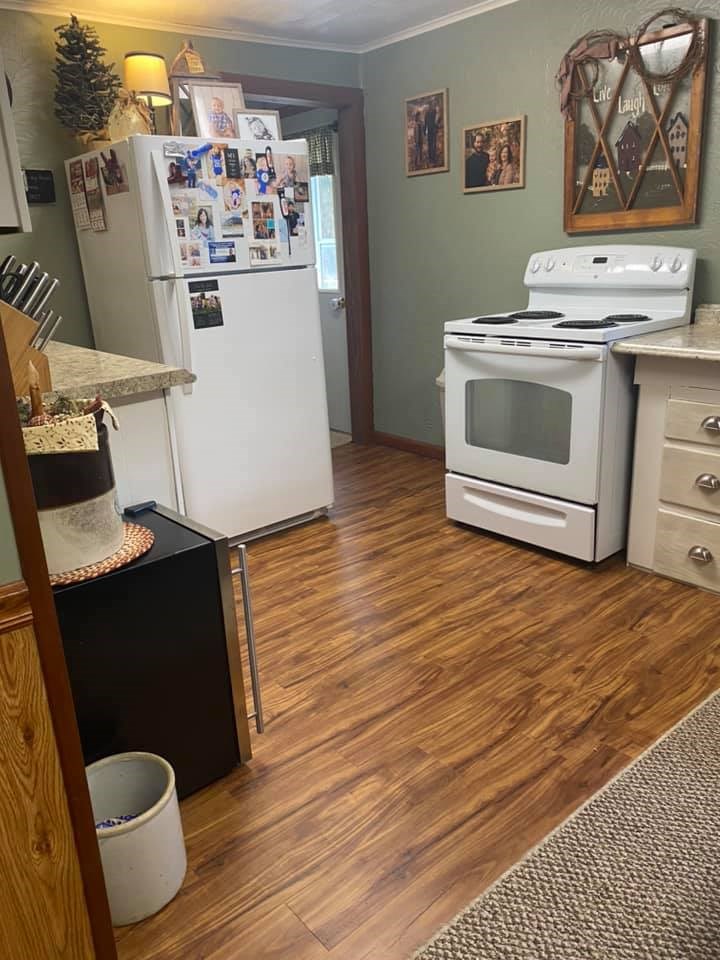 455 Fairview Road Dayton, PA 16222 - Photo 3 of 31 a view of water heater room with wooden floor