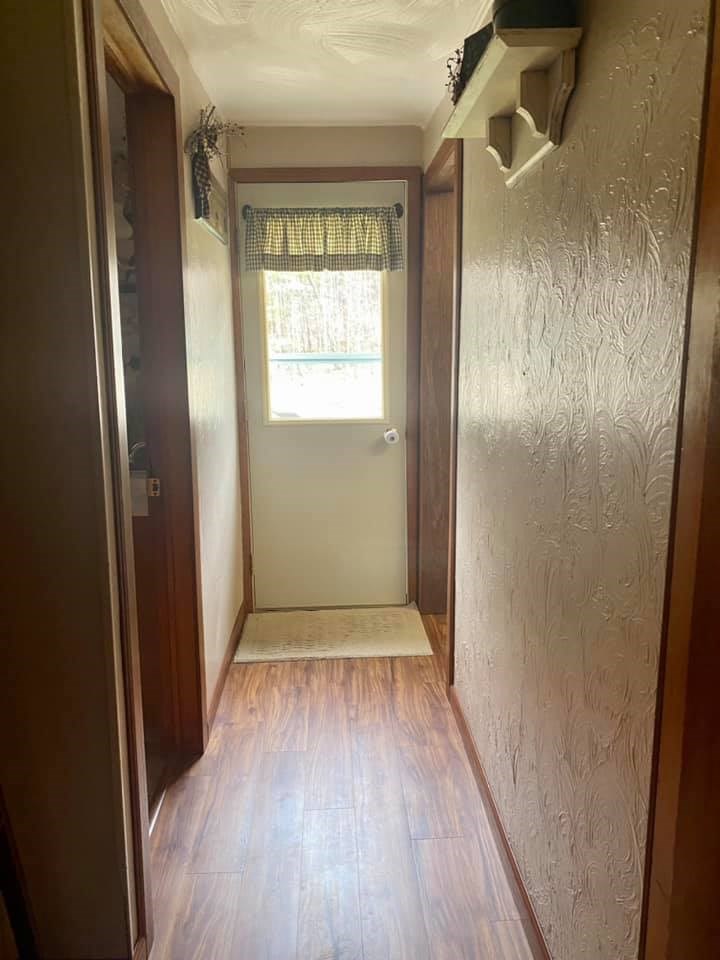 455 Fairview Road Dayton, PA 16222 - Photo 10 of 31 a view of a hallway with wooden floor