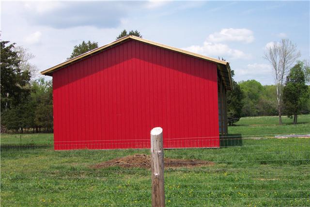 2452 Bob Cheek Road Lewisburg, TN 37091 - Photo 19 of 20 FENCED IN LARGE RED BARN WITH EQUIPMENT STORAGE STALLS