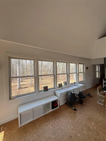 a room with furniture and windows