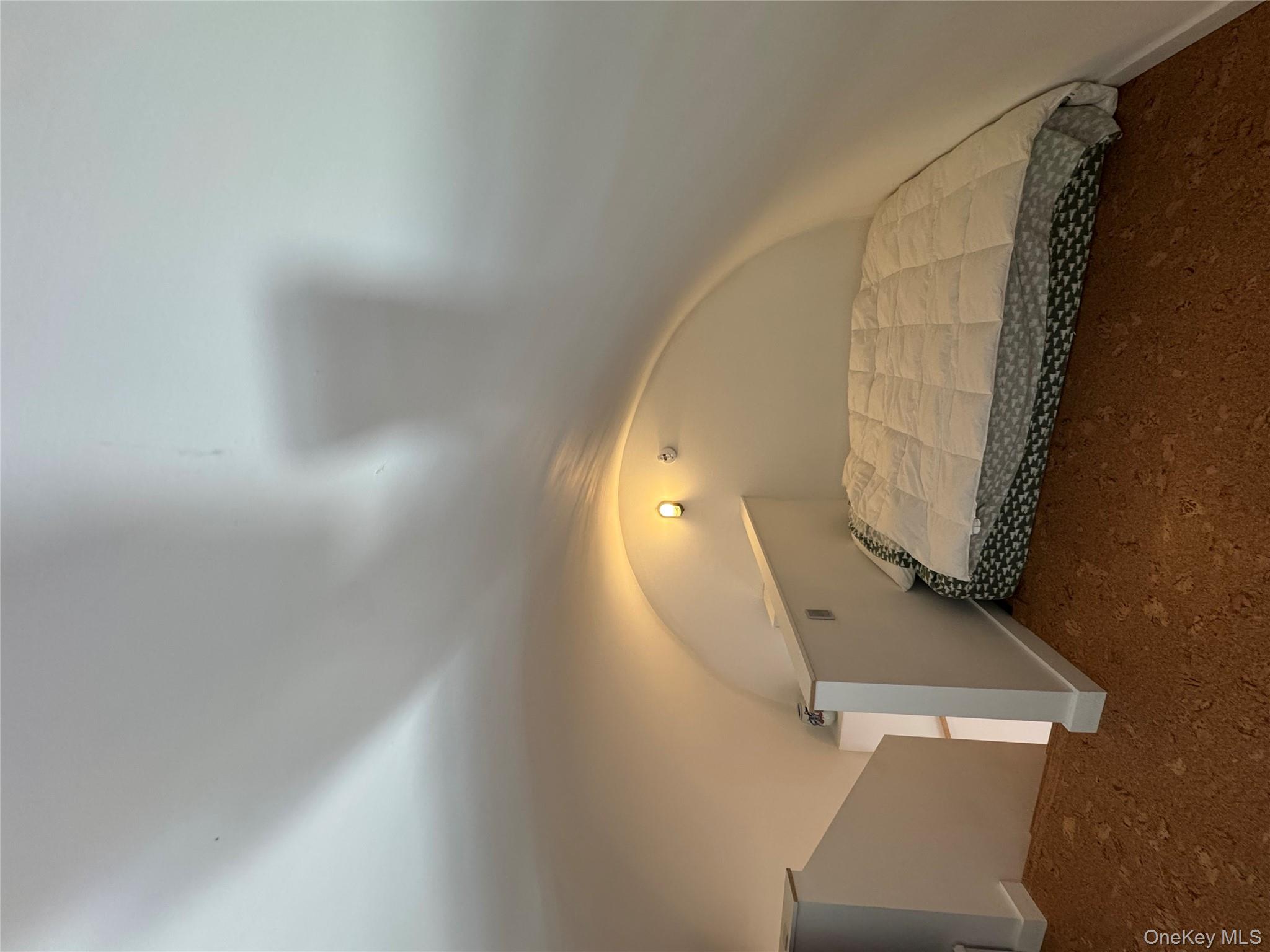 40 Pioneer Road Gardiner, NY 12525 - Photo 23 of 24 a bedroom with a bed and a night stand